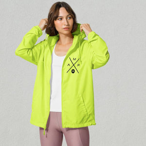 a woman rocking an amp swagg amp x windbreaker in neon yellow