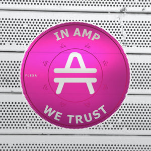 AMP Token 3D Ortho Sticker "In AMP We Trust" in a large size on a bench