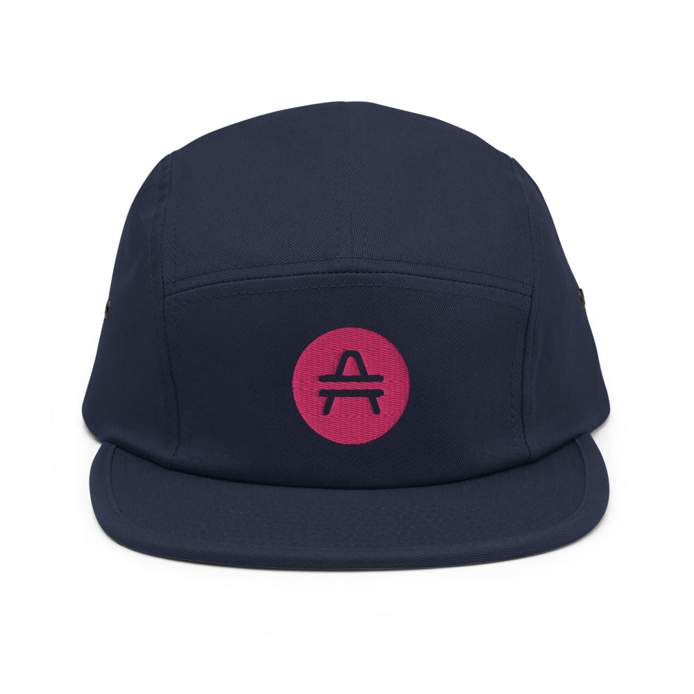 A navy 5 panel cap with an AMP Token AMP swagg alt-logo
