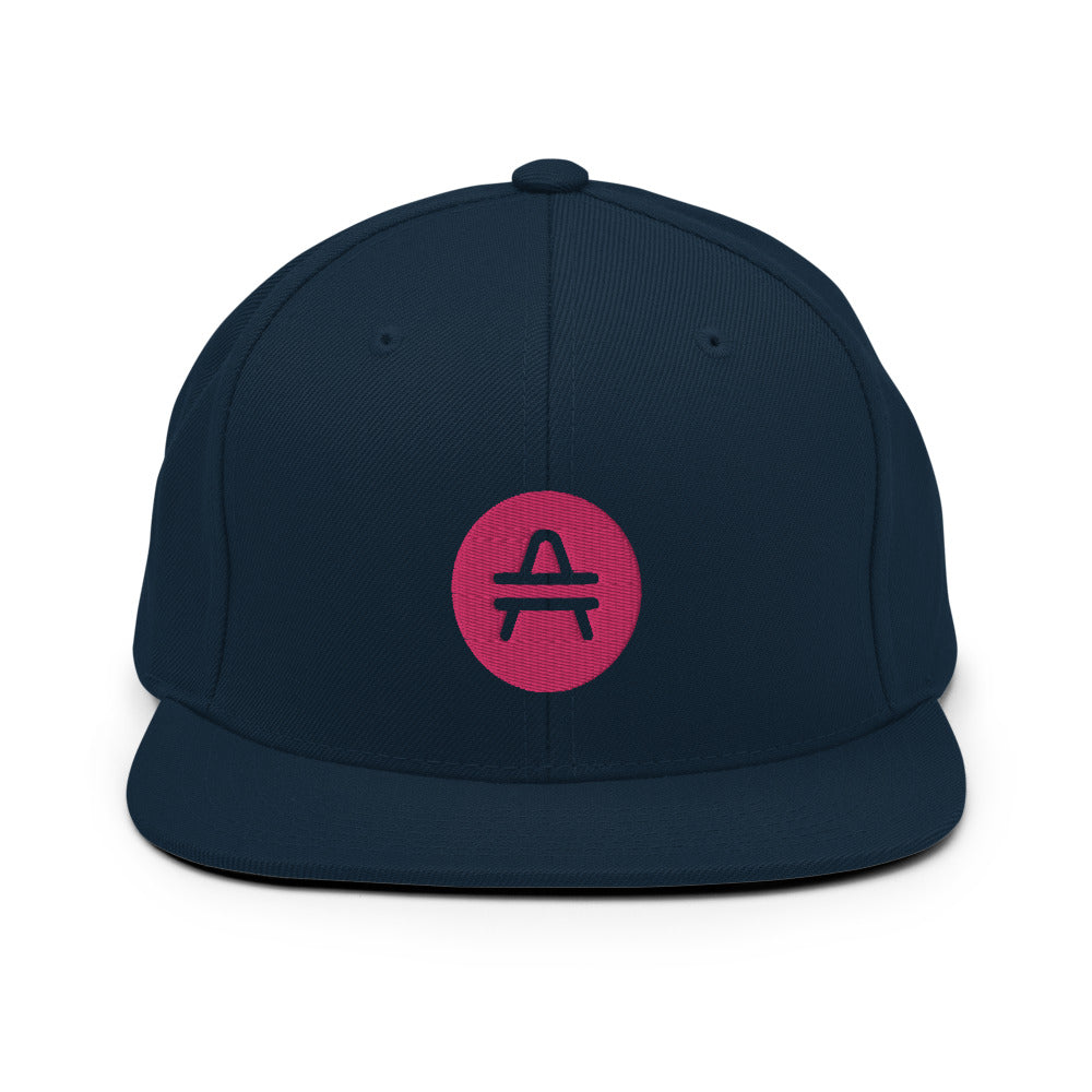 A dark navy AMP Token AMP swagg alt-logo snapback