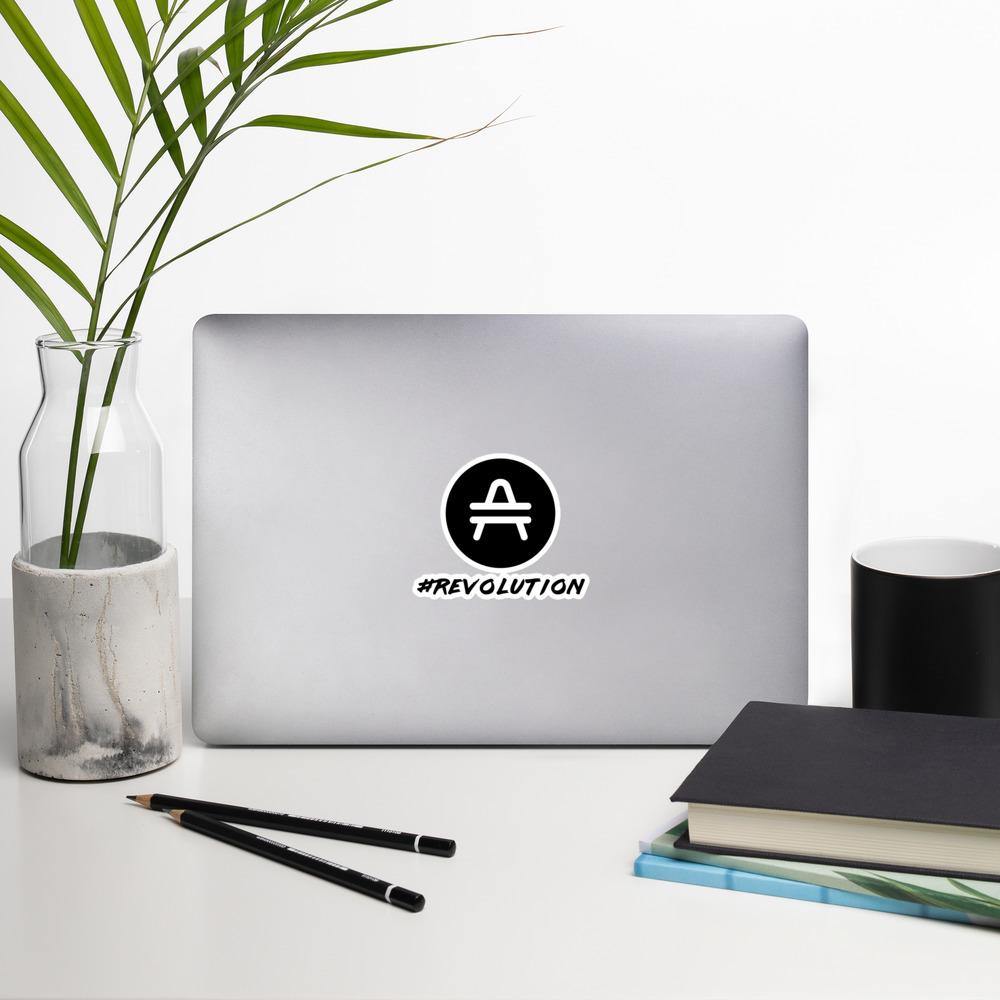 AMP Token Revolution Sticker in medium size on a macbook