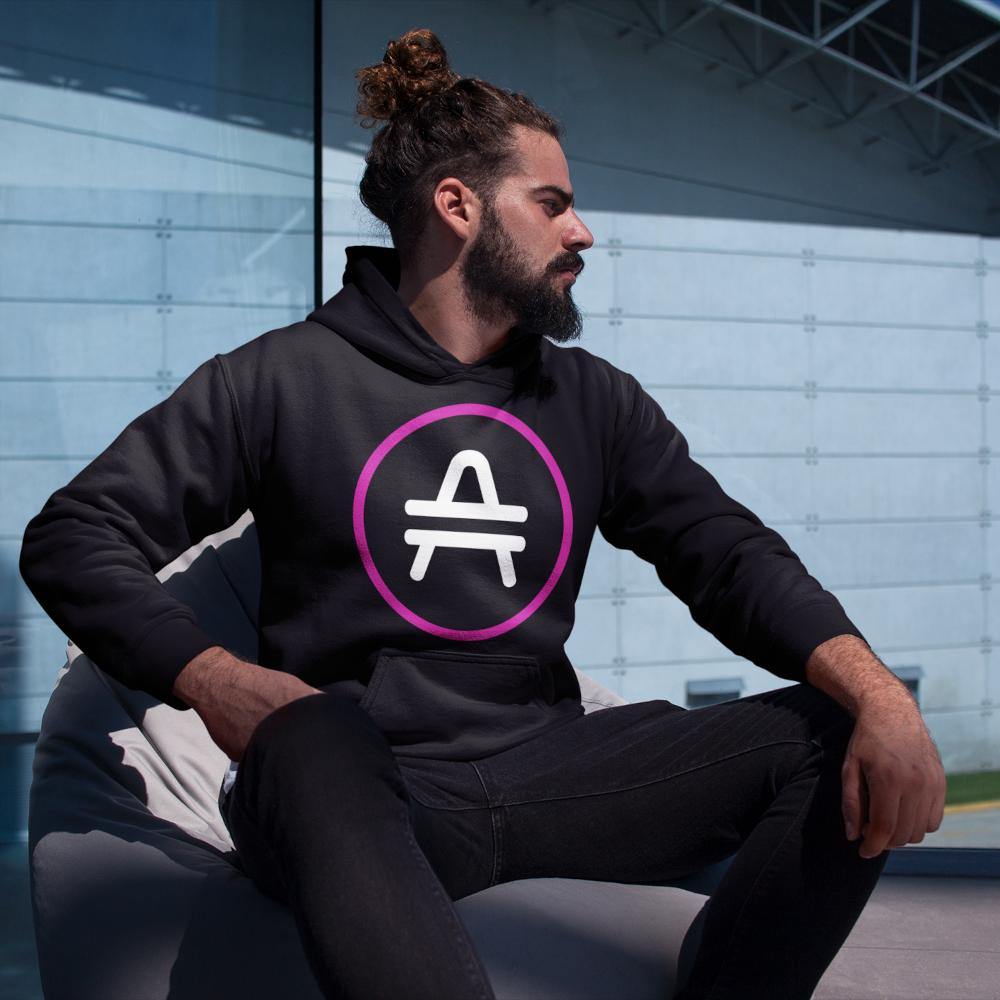 Man wearing a black AMP Token AMP swagg alt-logo hoodie