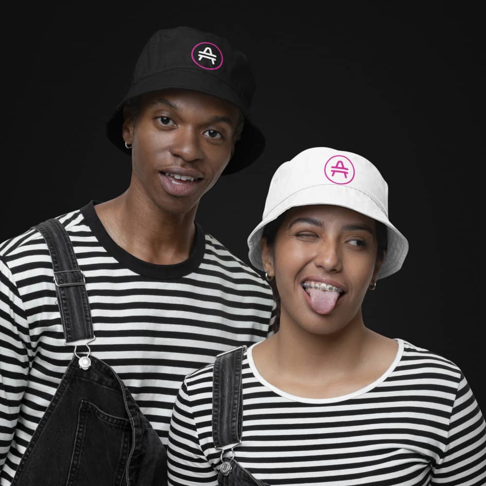 man and woman rocking an amp swagg bucket hat in black and white