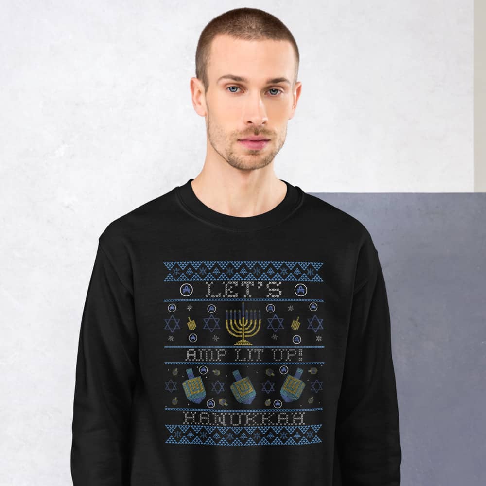 a man wearing an amp swagg ugly hanukkah sweater in black