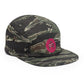A camo 5 panel cap with an AMP Token AMP swagg alt-logo