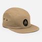 A khaki green 5 panel cap with an AMP Token AMP swagg alt-logo