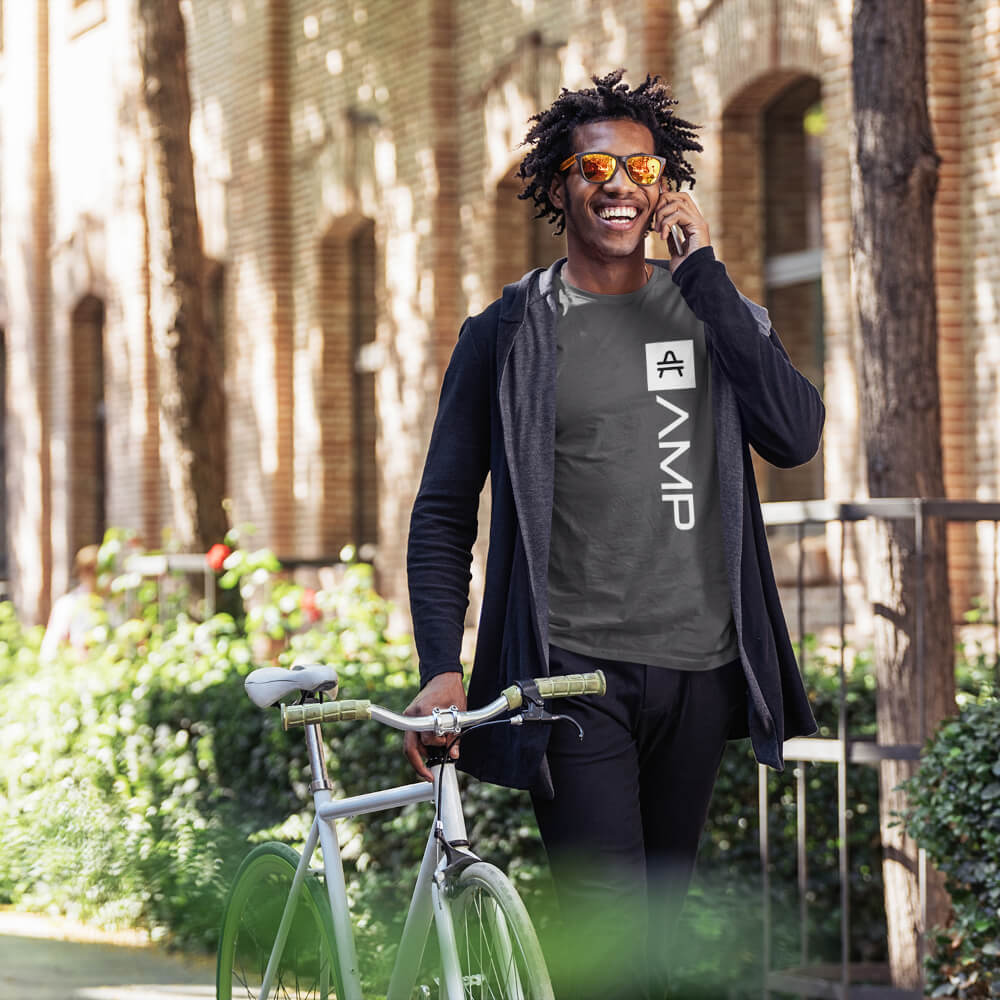 Guy with bike wearing an Asphalt AMP Token Amp Swagg Lambda Shirt