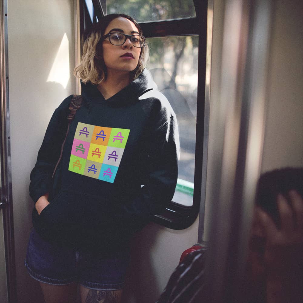 A girl rocking an AMP Swagg Pop Art hoodie in Black