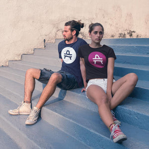 Couple Wearing AMP Token Solid Alt Logo Shirts in a dark navy and black color