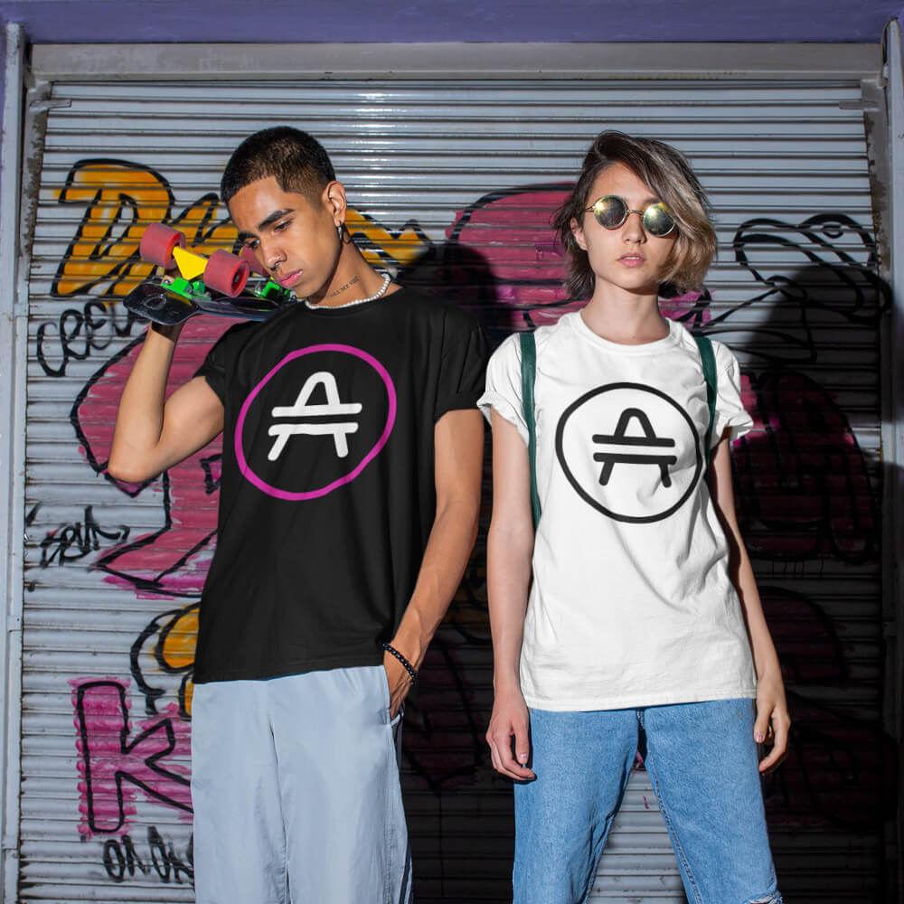 Skater Guy and Girl Wearing AMP Token Stenciled Alt Logo Shirts in a black and white colors