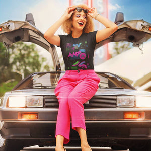 a woman wearing an AMP Swagg retro T-shirt in black