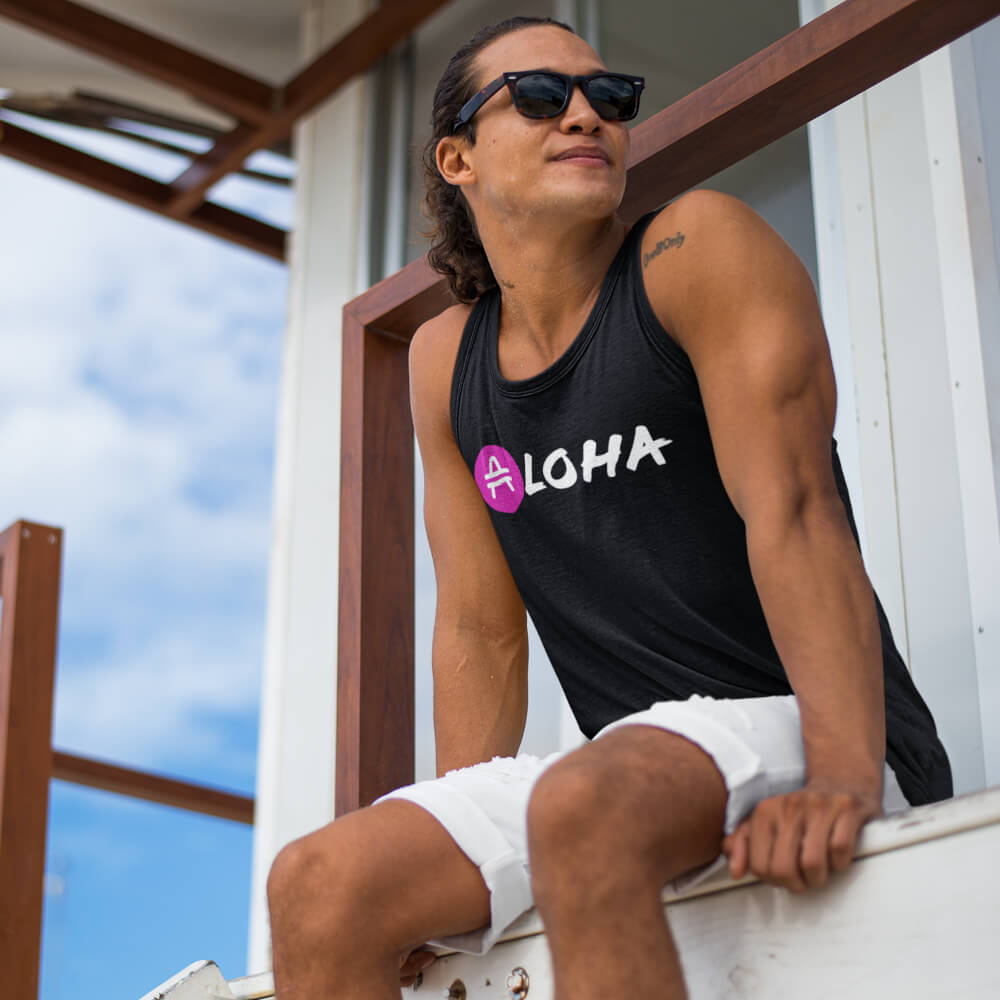 A guy wearing an AMP Token AMP swagg Aloha tank in black
