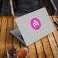AMP Token Whale Sticker in a small size on a macbook