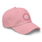   A pink AMP Token AMP Swagg alt-logo cap