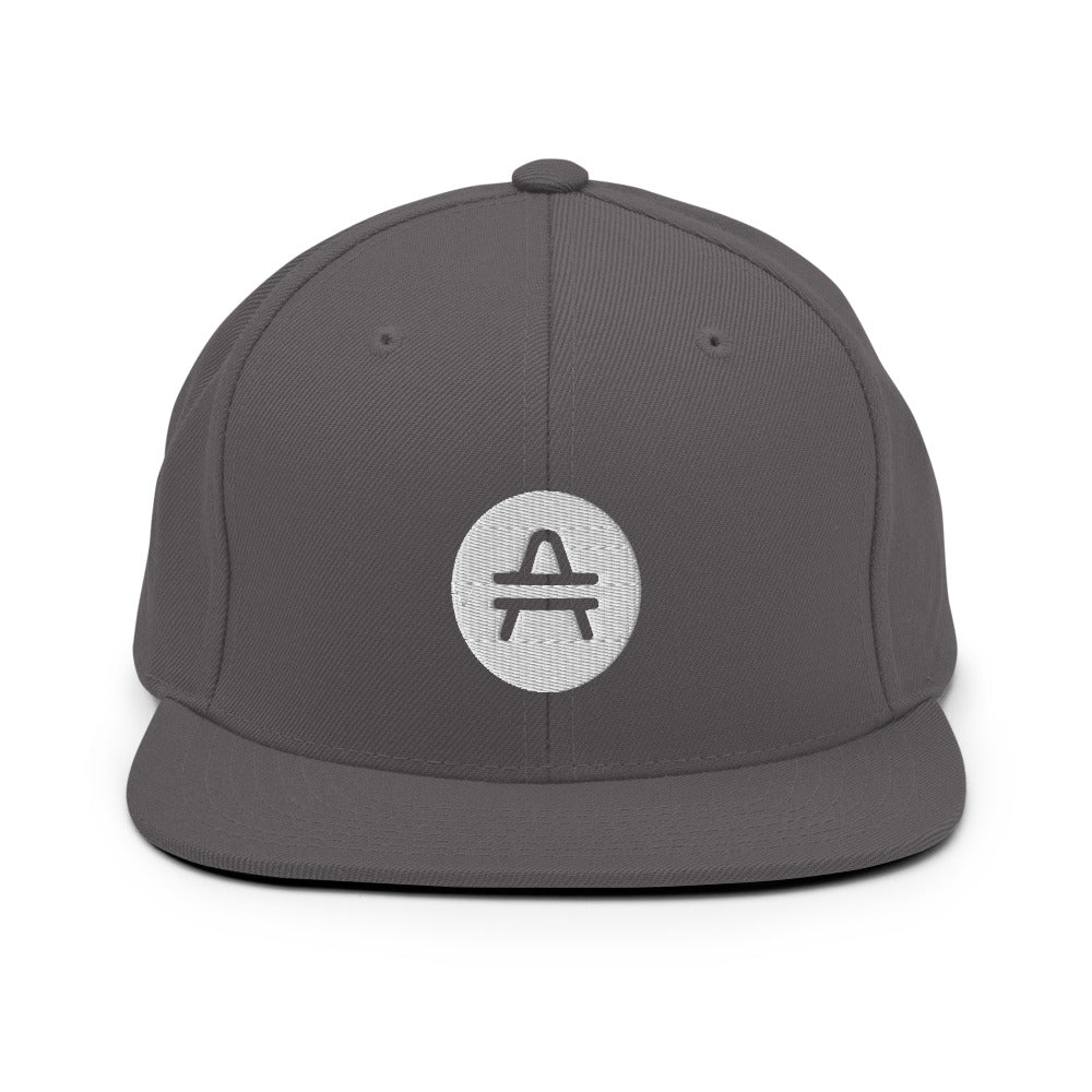 A dark grey AMP Token AMP swagg alt-logo snapback