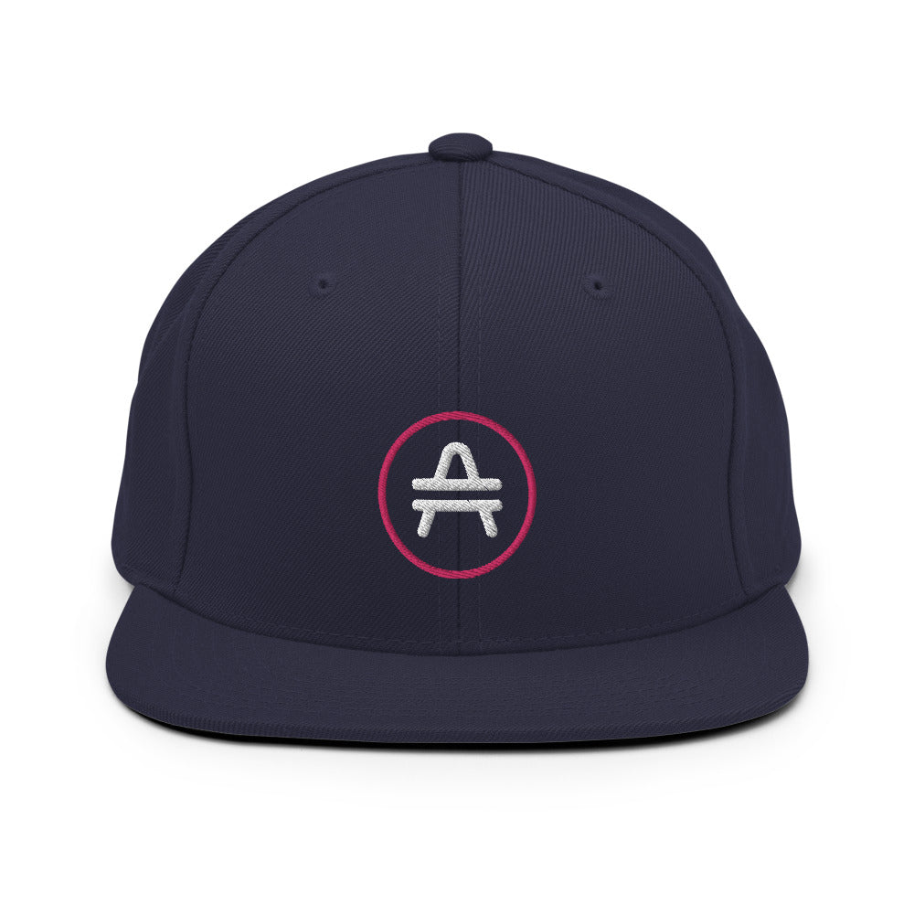 A navy AMP Token AMP swagg snapback hat