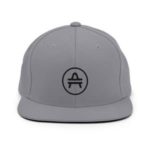 A silver AMP Token AMP swagg snapback hat