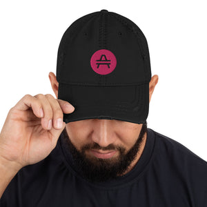 AMP Token Solid Alt-logo Distressed Hat in black worn by a man