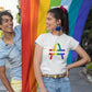 AMP Token Inverse PRIDE T-Shirt in white worn by a woman