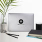 AMP Token Revolution Sticker in medium size on a macbook
