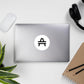 AMP Token Solid Alt-logo Sticker in medium placed on top of a silver laptop