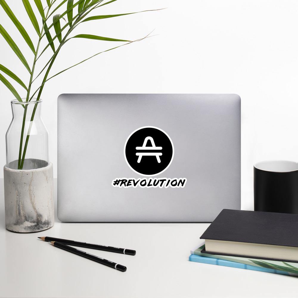 AMP Token Revolution Sticker in large size on a macbook