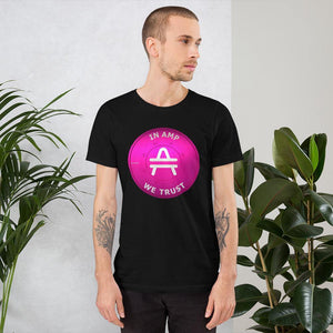 Tattooed Young guy standing in front of plants Wearing AMP Token 3D AMP rendering Shirt in a black color