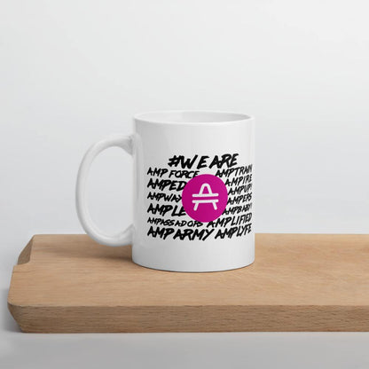 AMP Token White Mug #WE-ARE 11oz in white sitting on a shelf