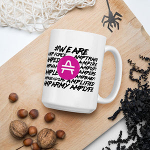 AMP Token White Mug #WE-ARE 15oz in white laying on a shelf near coffee beans